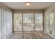 Sun Room with lots of natural light and views to backyard at 104 Natchez Trce, Atlanta, GA 30350
