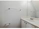 Bright bathroom featuring a white vanity, countertop, and essential fixtures at 10900 Wittenridge Dr # D5, Alpharetta, GA 30022