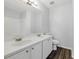 Bright bathroom featuring double sinks and a full shower and tub at 10900 Wittenridge Dr # D5, Alpharetta, GA 30022