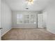 Bedroom with natural light from three windows and white shutters at 10900 Wittenridge Dr # D5, Alpharetta, GA 30022