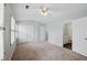 Spacious bedroom with a bathroom and closet door visible at 10900 Wittenridge Dr # D5, Alpharetta, GA 30022