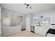 Open concept kitchen showcasing stainless steel appliances and a seamless flow to other rooms at 10900 Wittenridge Dr # D5, Alpharetta, GA 30022