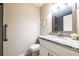 Bathroom featuring vanity with granite countertop, and gray tile and glass-enclosed shower at 1207 Mcclelen Way, Decatur, GA 30033