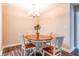 Cozy dining area featuring wood-look flooring and a stylish chandelier at 1207 Mcclelen Way, Decatur, GA 30033