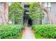Charming condo exterior shows entryway with stairs leading to upper units at 1207 Mcclelen Way, Decatur, GA 30033