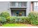 Condo exterior features private balcony and sliding glass doors at 1207 Mcclelen Way, Decatur, GA 30033