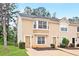 Charming two-story home featuring a well-maintained lawn and inviting curb appeal with beautiful front windows at 3116 Fields Dr, Lithonia, GA 30038