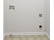 Bright laundry area features connections for washer and dryer on neutral paint at 3116 Fields Dr, Lithonia, GA 30038