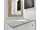 Bathroom vanity with granite counter and decorative mirror at 925 Crab Orchard Dr, Roswell, GA 30076