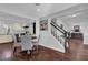 Charming dining area with hardwood floors, stylish furnishings, and easy access to the staircase at 925 Crab Orchard Dr, Roswell, GA 30076