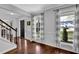 Bright foyer featuring hardwood floors, a staircase, and windows offering great natural light at 925 Crab Orchard Dr, Roswell, GA 30076
