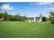The home features a large grassy backyard ideal for Gathering gatherings, outdoor activities, and relaxation at 111 Shenandoah Ct, Hiram, GA 30141