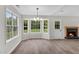Open dining area featuring a bay window, modern chandelier, and wood look flooring at 111 Shenandoah Ct, Hiram, GA 30141
