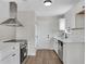 Modern kitchen with stainless steel appliances, white cabinetry and countertops at 111 Shenandoah Ct, Hiram, GA 30141