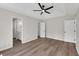 Main bedroom includes a tray ceiling, ceiling fan, and an ensuite bath and closet at 111 Shenandoah Ct, Hiram, GA 30141