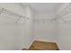 Walk-in closet with wood floors and metal shelving at 111 Shenandoah Ct, Hiram, GA 30141