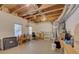 Unfinished basement space with exposed ceiling, a window view, and ample room for storage at 1658 Lightfoot Cir, Marietta, GA 30062