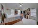 Bedroom with carpet, built in shelves, desk and lots of natural light at 1658 Lightfoot Cir, Marietta, GA 30062