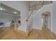 Open foyer with hardwood floors and staircase leading to the second floor at 1658 Lightfoot Cir, Marietta, GA 30062