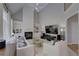 Spacious living room with fireplace, built-in shelving, and vaulted ceiling at 1658 Lightfoot Cir, Marietta, GA 30062