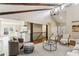 Spacious living area with vaulted ceilings, hardwood floors, and an open floor plan at 645 Trailmore Pl, Roswell, GA 30076
