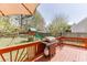 Spacious outdoor deck featuring a stainless steel grill and ' playground equipment at 1480 Bramlett Forest Se Trl, Lawrenceville, GA 30045