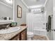 Bathroom showcasing a single sink vanity with granite countertops and a shower with a curtain at 2466 Monroe Jersey Rd, Covington, GA 30014