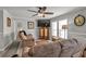 Serene living room featuring natural light, hardwood floors, and a comfortable seating arrangement at 2466 Monroe Jersey Rd, Covington, GA 30014