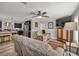 Open-concept living room showcasing the kitchen and hardwood floors at 2466 Monroe Jersey Rd, Covington, GA 30014