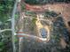 Birds eye aerial view of the home and surrounding acreage at 313 Morgan Rd, Temple, GA 30179