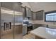 Well-equipped kitchen with stainless steel appliances, light countertops, and efficient cabinet space at 313 Morgan Rd, Temple, GA 30179