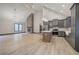 Open living space with fireplace and connected modern kitchen at 313 Morgan Rd, Temple, GA 30179