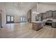 Connected living space with modern kitchen and living room with fireplace at 313 Morgan Rd, Temple, GA 30179