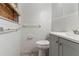 Updated bathroom features a gray vanity, white tile and updated fixtures at 3932 Lindsey Dr, Decatur, GA 30035