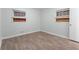 Neutral bedroom with gray walls, wood-look flooring at 3932 Lindsey Dr, Decatur, GA 30035