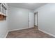 A clean bedroom featuring gray walls, and wood-look flooring at 3932 Lindsey Dr, Decatur, GA 30035