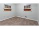 Bright bedroom featuring gray walls, and wood-look flooring at 3932 Lindsey Dr, Decatur, GA 30035