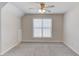 Bedroom featuring neutral-colored walls, new carpet, and a bright window at 4155 Cami Way, Buford, GA 30519