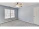 Bedroom featuring neutral-colored walls, new carpet, and a ceiling fan at 4155 Cami Way, Buford, GA 30519