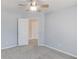 Light-filled bedroom featuring neutral-colored walls, new carpet, and two closets at 4155 Cami Way, Buford, GA 30519