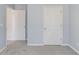 Bedroom featuring neutral-colored walls, new carpet, and two closets at 4155 Cami Way, Buford, GA 30519