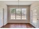 Dining area illuminated by natural light with large windows, perfect for Gathering meals at 4155 Cami Way, Buford, GA 30519