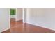 Spacious room featuring hardwood floors and neutral walls, ready for your personal design touch at 4155 Cami Way, Buford, GA 30519