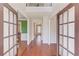 Spacious foyer with hardwood floors, complemented by natural light and an open view of the home's layout at 4155 Cami Way, Buford, GA 30519