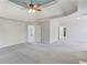 Expansive living room offering neutral carpet and easy access to other areas of the home at 4155 Cami Way, Buford, GA 30519