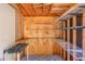 Organized shed interior with shelving and a workbench, great for storage and DIY projects at 4155 Cami Way, Buford, GA 30519