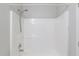 Clean, streamlined shower space with adjustable shower head and integrated shelving at 4155 Cami Way, Buford, GA 30519