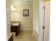Bright bathroom featuring a vanity with a granite countertop and tile flooring at 1440 Gallup Dr, Stockbridge, GA 30281