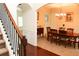 Elegant dining room with hardwood floors, wainscoting, and a chandelier at 1440 Gallup Dr, Stockbridge, GA 30281