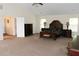 Spacious primary bedroom with vaulted ceiling, ceiling fan and en-suite bath at 1440 Gallup Dr, Stockbridge, GA 30281